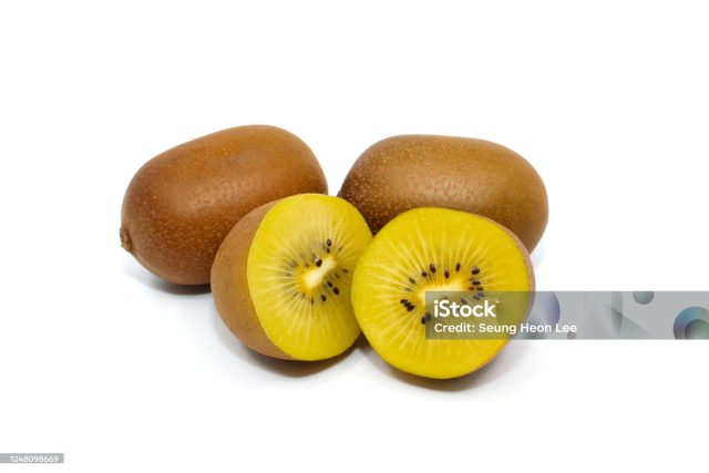 gold kiwi and green kiwi isolated in white background